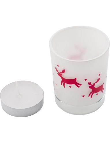 Vaso de cristal con vela y decorado navideño....