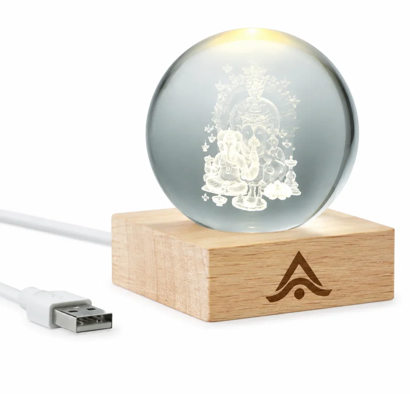 Bola de vidrio con luz LED personalizada sobre base de madera