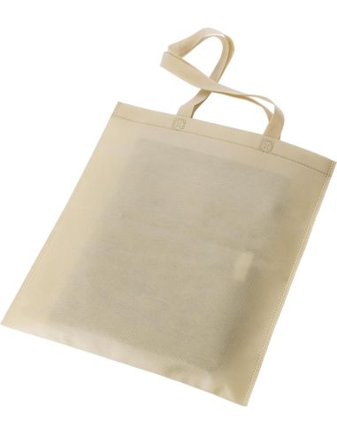 Tote bag personalizada con logo, colgada del mostrador de una tienda